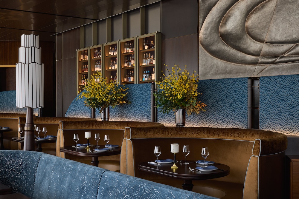 Avenue Sky Lounge dining room with blue banquettes