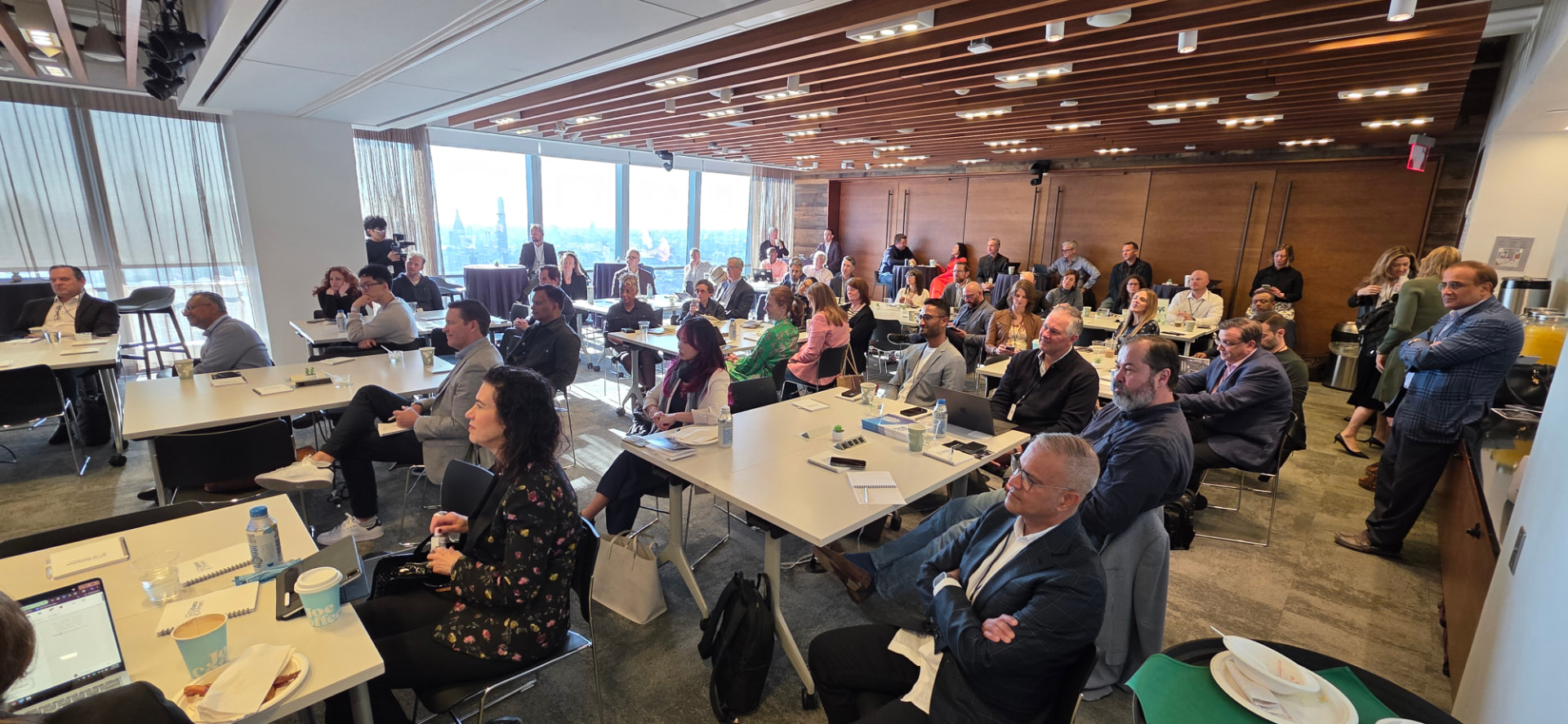 Athena Project Salon audience seated in the Metropolitan Room at BCG